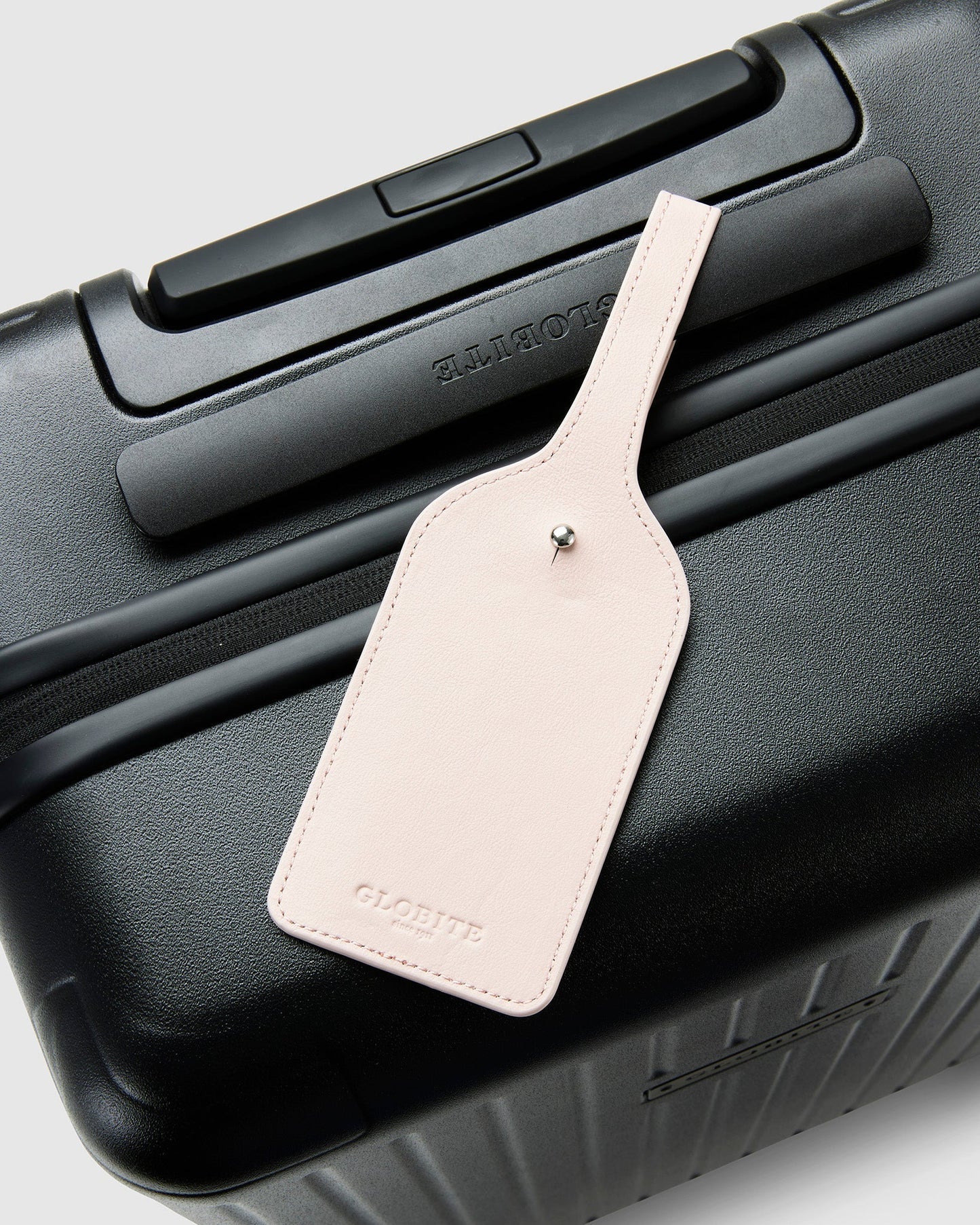 Pink Rose Leather Luggage Tag on Suitcase